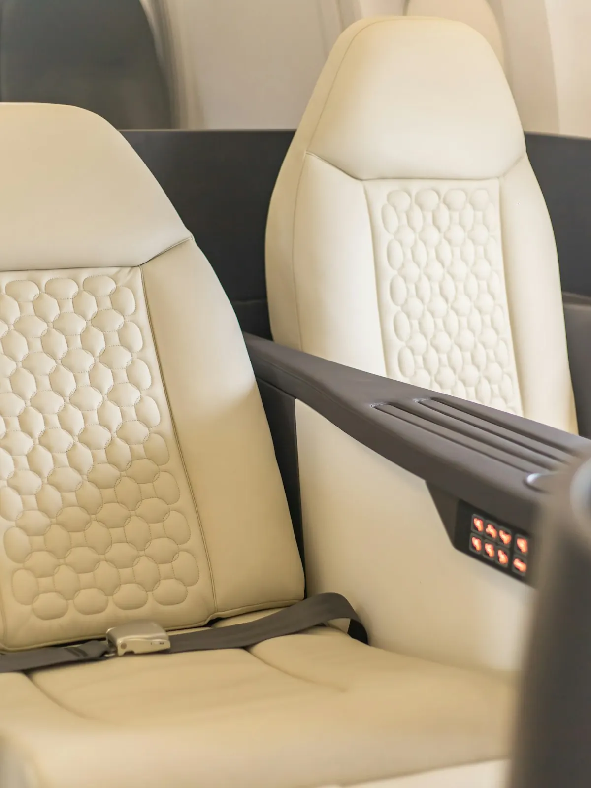 Cream leather jet seats facing each other